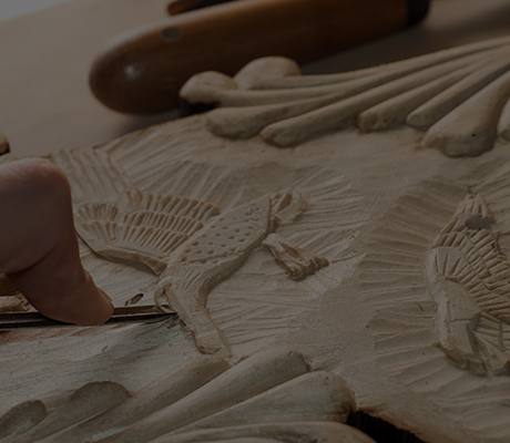 Wood carving artisan at work