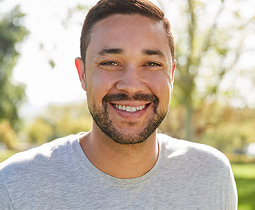 Smiling person outdoors at fair