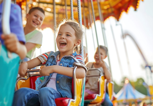 Children enjoying swing ride fun