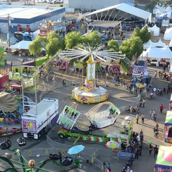 Outdoor festival with amusement rides